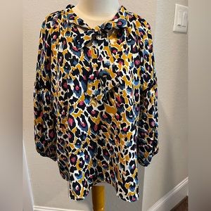 Jade Melody Tam Leopard Print Tie Neck, Ladder Trim Raglan Balloon Sleeve Blouse